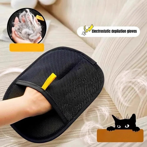 The mitt worn on a hand, with a handful of collected pet hair