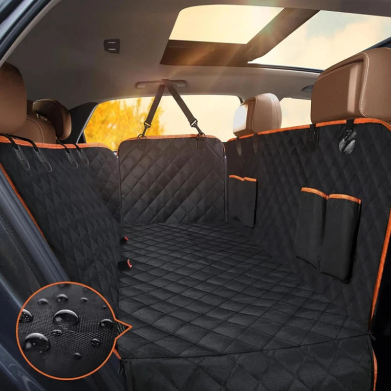 The hammock fitted across a back seat showing side flaps, storage pockets and headrest straps